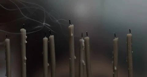 Smoke from candles on the blurred background Stock Footage 143125986