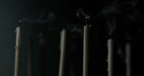Smoke from candles on the blurred background Stock Footage 143126408