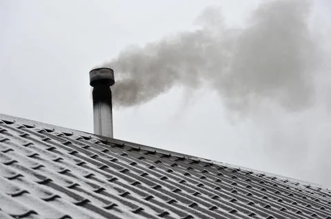 The smoke from the chimney baths Foto stock