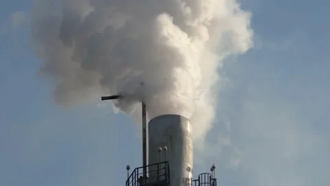 Smoke from chimney. Close-up. The steam rises. Smoke escapes from pipe under Vidéo 162953262