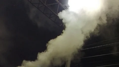 The smoke from the chimney at night Stock Footage 74861880