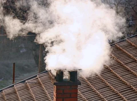 Smoke from the chimney Stock Photos