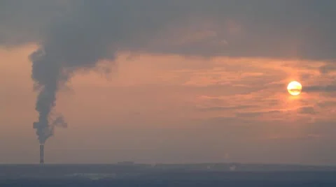 Smoke from chimney at sunset Stock Footage 10680820