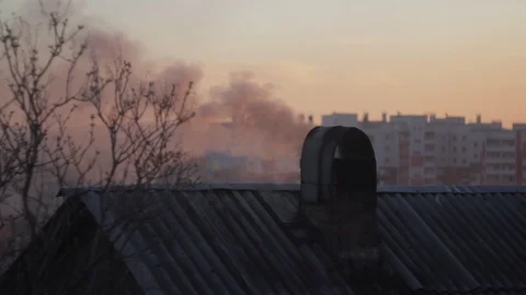 Smoke from the chimney at sunset Stock Footage 89741107