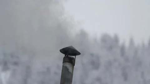 Smoke from the chimney in winter	 Stock Footage 94396046
