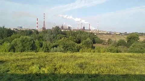 Smoke from chimneys on the background of nature Stock Footage 159429178