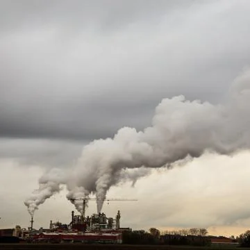 Smoke from the chimneys Stock Photos