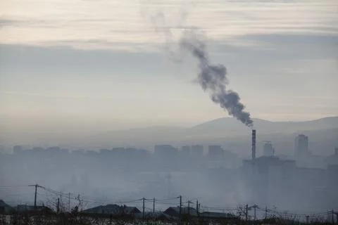 The smoke from the chimneys Stock Photos