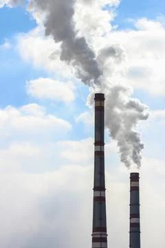 Smoke from chimneys Stock Photos