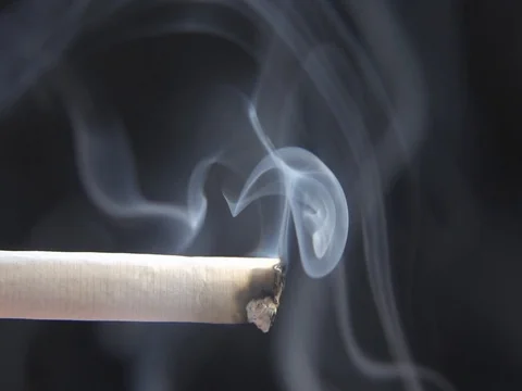 Smoke from a cigarette in slow motion Stock Footage 80560956