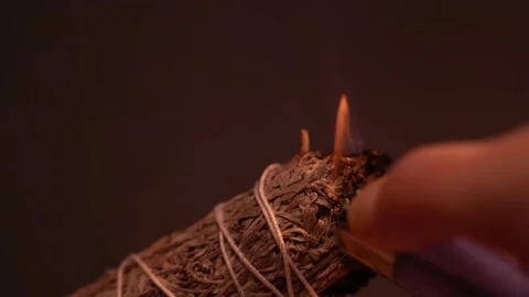 Smoke cleanse, lighting up and burning white sage, cleansing aura Stock Footage 230048013