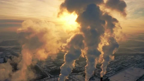 Smoke closes the sun close-up. Shot from the air, puffs of smoke blocking the Stock Footage 183386352