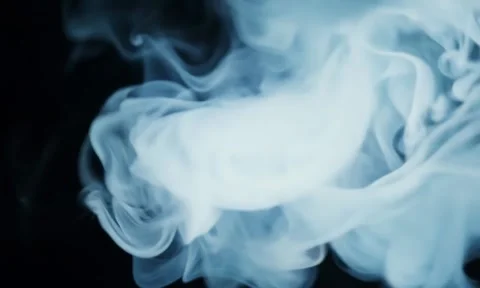 Smoke. Cloud of cold fog in blue light spot on black background Stock Footage 302286038