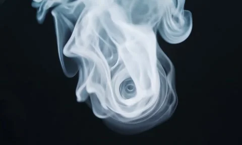 Smoke. Cloud of cold fog in blue light spot on black background Stock Footage 302286265