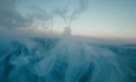 Smoke. Cloud of cold fog in blue light spot on black background Stock Footage 302286377