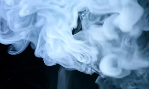 Smoke. Cloud of cold fog in blue light spot on black background Stock Footage 302286416