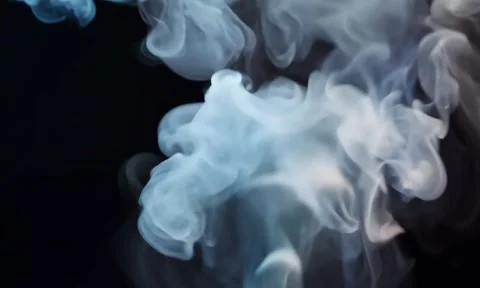 Smoke. Cloud of cold fog in blue light spot on black background Stock Footage 302286419