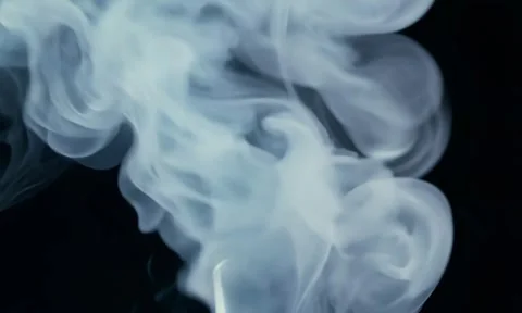 Smoke. Cloud of cold fog in blue light spot on black background Stock Footage 302287742