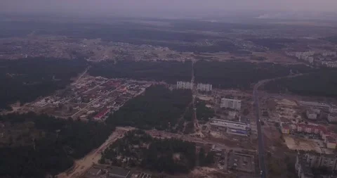Smoke cloud settling in small town from nearby forest fires. Drone vi Stock Footage 141866003