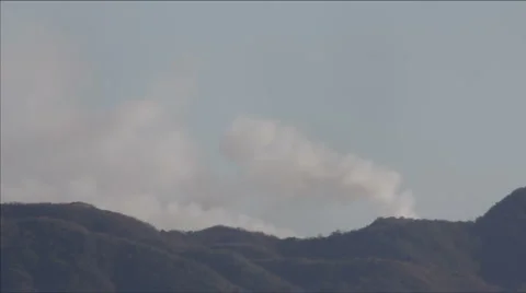 Smoke clouds billowing Stock Footage 1086346