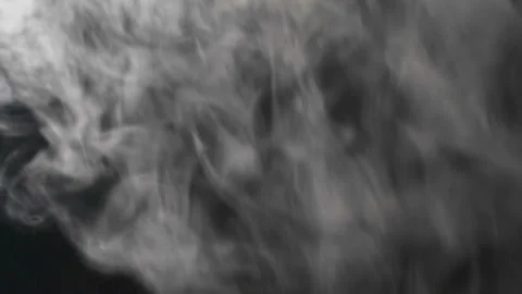 Smoke clouds on a black background Stock Footage 96118325