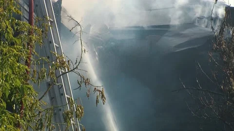 Smoke Clouds From Burnt Building With Burned Roof, Fire Disaster Stock Footage 142180494