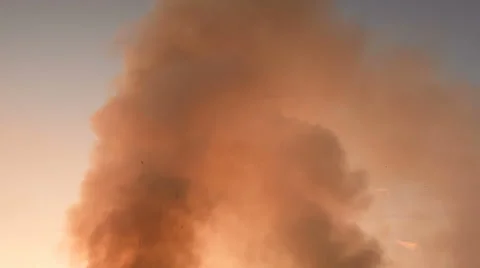 Smoke clouds with sky background Stock Footage 64257874