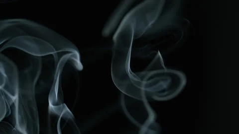 Smoke clouds slowly coming on black isolated background flowing effect closeup Stock Footage 332506591