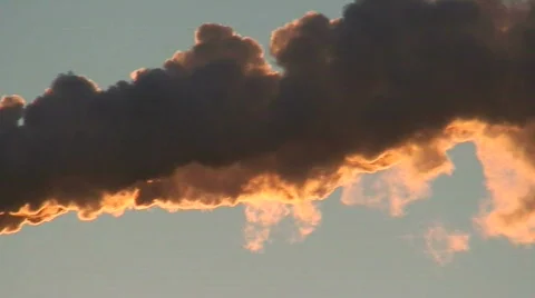Smoke clouds at sunrise Stock Footage 63329