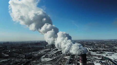 Smoke from a coal processing plant. Aerial survey of power plant pipe exhausts. Stock Footage 171870412