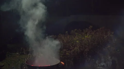 Smoke comes from the barbecue maker 스톡 동영상 166962163
