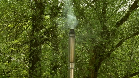 Smoke comes from the chimney.  Stock Footage 106111993