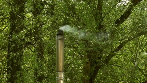 Smoke comes from the chimney.  Stock Footage 106112274