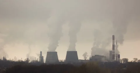 The smoke comes from the chimneys Stock Footage 61504958