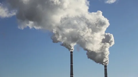 The smoke comes from the chimneys in winter Stock Footage 69871159