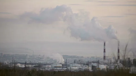 The smoke comes from the chimneys in winter, timelaps Stock Footage 46366133