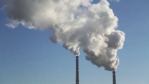 The smoke comes from the chimneys in winter, timelaps Stock Footage 69871306