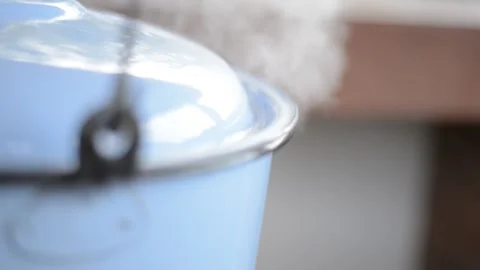 Smoke comig out of Hot Cooking Pot Stock Footage 147100655