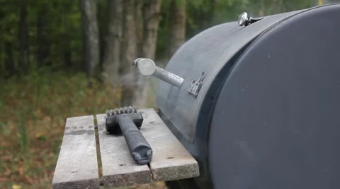 Smoke coming from a grill Stock Footage 61192821