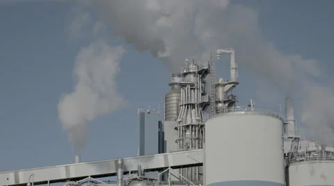Smoke coming from a large pulp factory Stock Footage 64553251