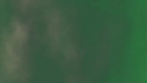 Smoke coming out of it clouds on plane is flying through the in sky some bunch Vídeo Stock 336955534