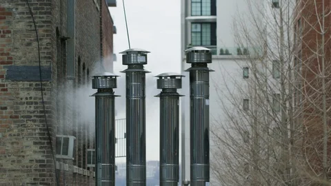 Smoke coming out from smoke stack Stock Footage 100049588