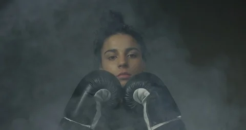 Smoke Consuming Active Beautiful Young Female In Classic Black Boxing Gloves Stock Footage 112781304