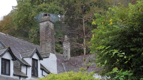 Smoke from cottage chimney Stock Footage 43379305