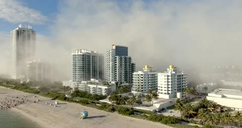 Smoke covers Miami Beach after  Deauville Beach Resort Miami Beach implosion  Stock-Footage 221191827