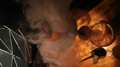Smoke curls in a hookah on a dark background Stock Footage 172319358