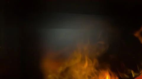 Smoke on a dark background rising from the fire in the fireplace Stock-Footage 163716694