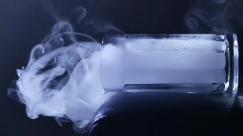 Smoke on a dark background. Vaping. 4K UHD Видео 63171249
