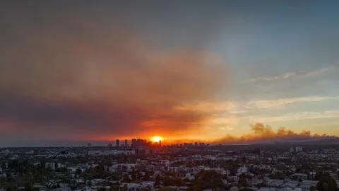  Smoke from devastating Pacific Palisades and Hollywood Hills fires cover LA sky Stock Footage 297418906