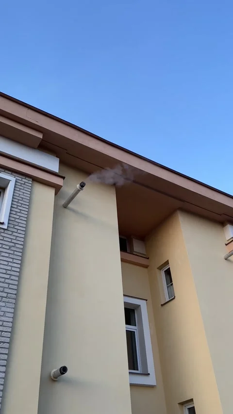 Smoke Emission from Building Vent Pipe Stock Footage 304008858